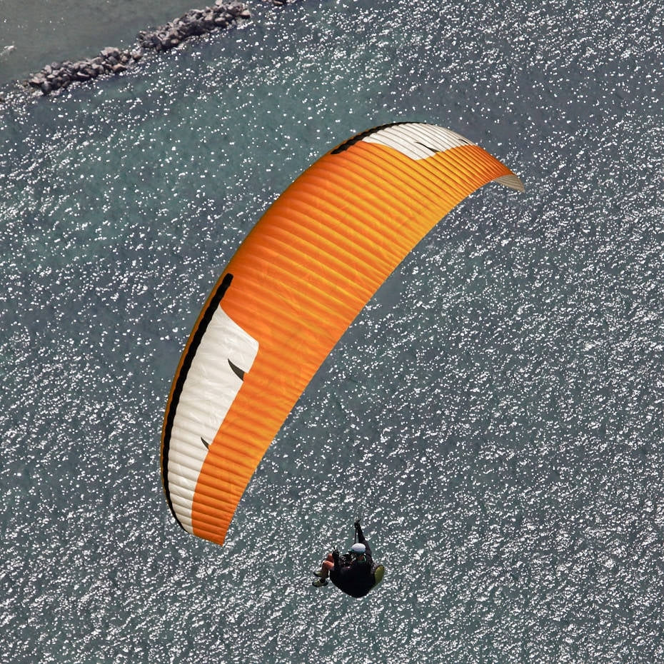 Niviuk Ikuma 2 P lightweight High B paraglider in colour Sun (orange-black-white)