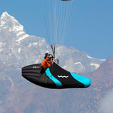 Woody Valley GTO light paragliding pod harness with Blue-Black speedbag (leg cover) fitted