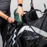 Spacious rear pocket with strategic telescopic trekking poles container