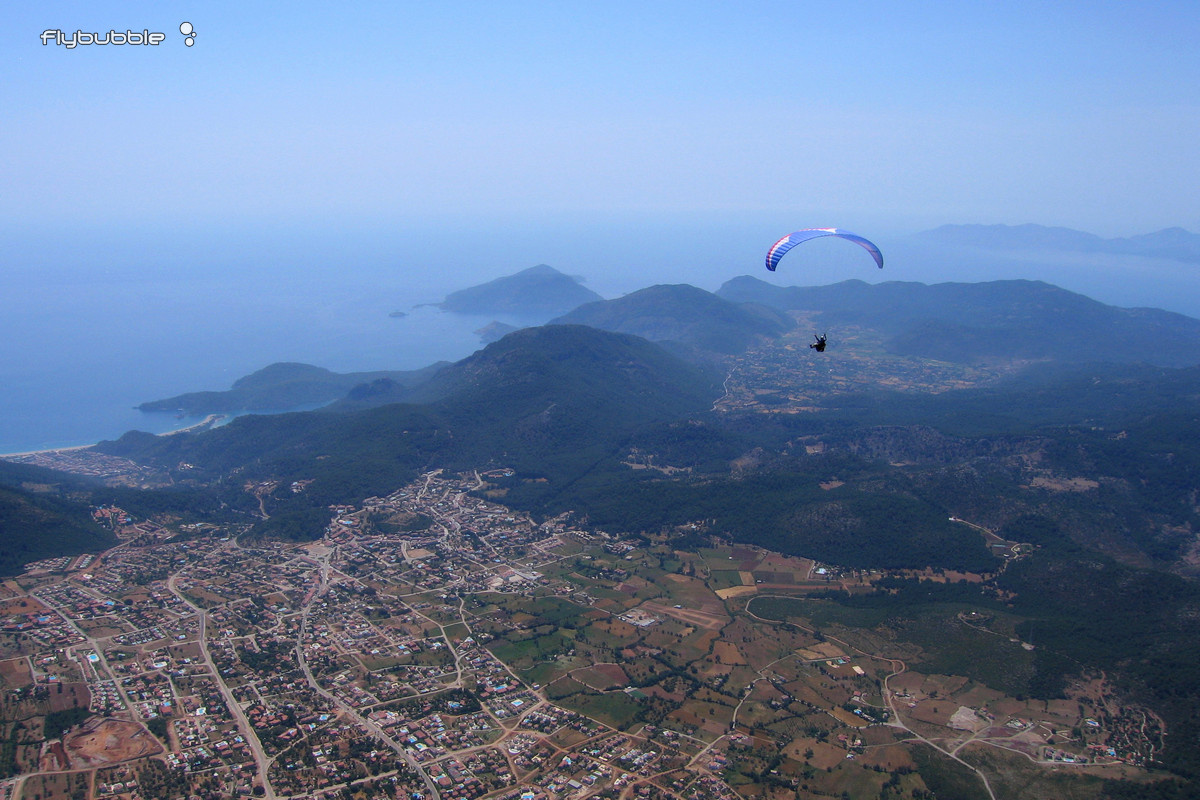 Julian gliding back towards Oludeniz after his amazing first XC flight with Carlo